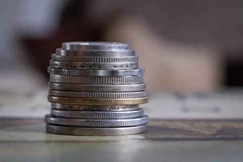 Close up of old coins on stack Stock Photos