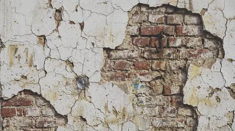 Close-up of old cracked brick wall. Фото