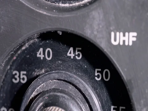 Close up of old fashioned dials on a vintage TV Stock Footage 84974545