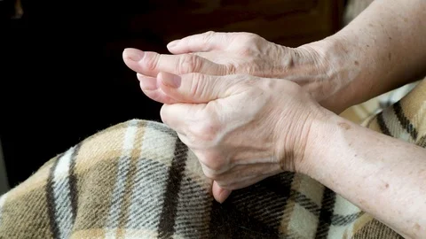 Close-up of an old female hands in the prosess of self-massage Stock Footage 128657266