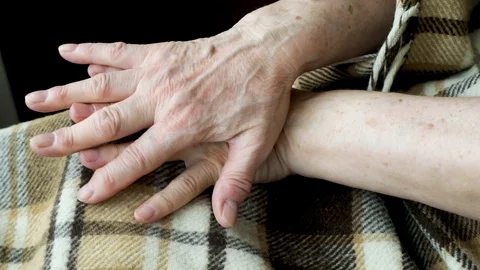 Close-up of an old female hands in the prosess of self-massage Stock Footage 128657330