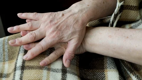 Close-up of an old female hands in the prosess of self-massage Stock Footage 128657533