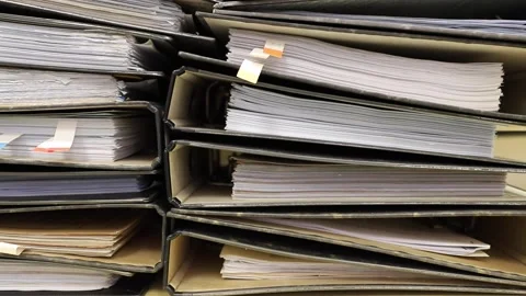 Close-up old files and papers of big folders in archives of business financia Stock Footage 146719804