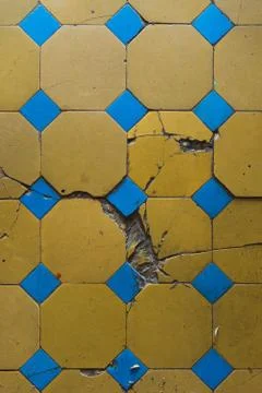 Close-up of an old floor tile with a two-tone pattern. Chapped floor tiles Stock Photos