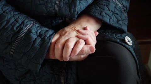 Close-up of old hands of an elderly 70 year old woman. Video stock 252348753