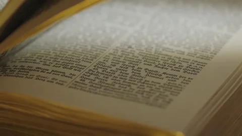 Close up of old Holy bible book Stock Footage 74499637