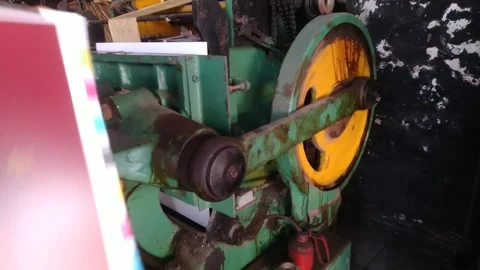 Close-up of an old industrial machine with green and yellow parts. 動画素材 339310684