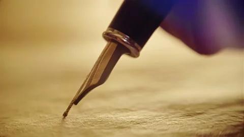 Close-up, old ink pen, writes on papyrus words and letters Stock Footage 131039028