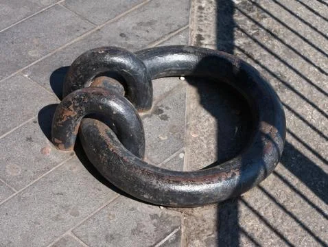 Close-up of an old iron dock ring still in situ at Canada Water, London, UK. Foto stock