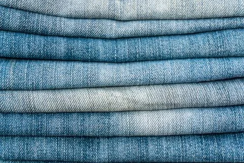 Close-up old Jeans trousers stack Stock Photos