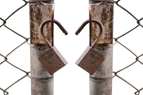 Close up of an old lock and a rusty chain on an iron gate isolated Stock Photos