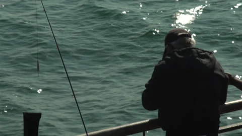 Close up of old man and his fishing rod Stock Footage 137266025