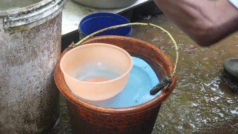 Close up of old man hands washing dishes outdoors Stock Footage 315189330