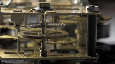 Close-up of an old mechanical clock. Pan Stock Footage 77934314