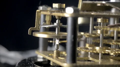 Close-up of an old mechanical clock. Rotate Stock Footage 77934407