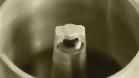 Close-up of an old moka pot brewing coffee (vintage style and sepia tone) Stock Footage 59950467