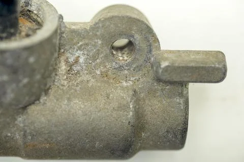 Close-up of an old, oxidized, and corroded vintage metal automotive or mach.. Stock Photos