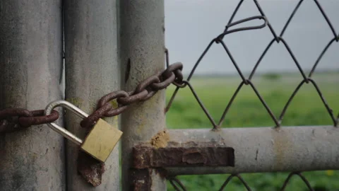 Close up old padlock and rusty chain on Stock Video Pond5