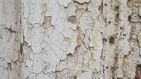 Close-up of old peeling paint surface. Фото
