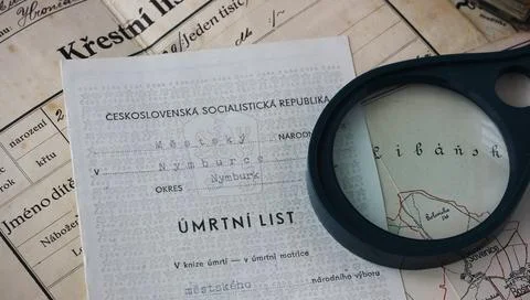 Close up of old personal documents - birth and death certificate - and a ma.. Stock Photos