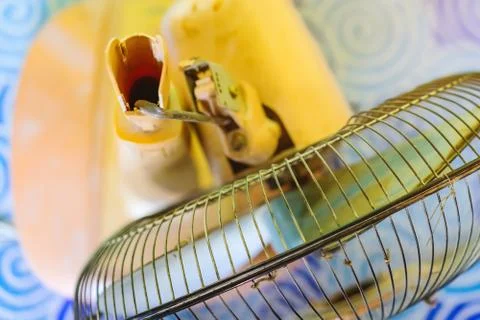 Close up to the old plastic joints of the electronic fan damaged and broken w Stock Photos