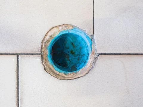 Close up of old plastic pipe water drain with dirty stains Stock Photos
