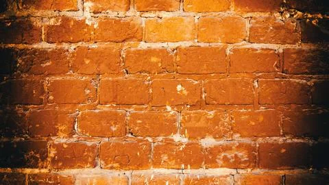 Close-up of an old red brick wall with vignetting effect Stock Photos