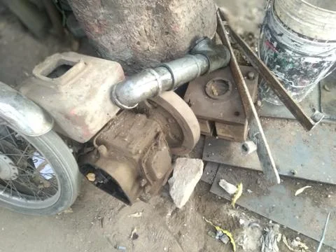 Close up old rust water pump under sunlight 스톡 사진