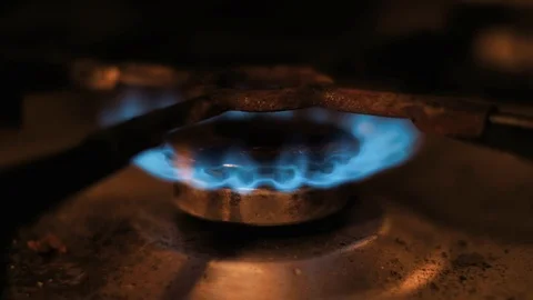 Close up old rusty dirty gas oven top burner stove fire starting Stock Footage 94832011
