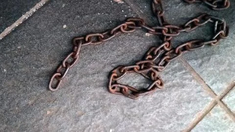 Close up of old rusty iron chain Stock Photos