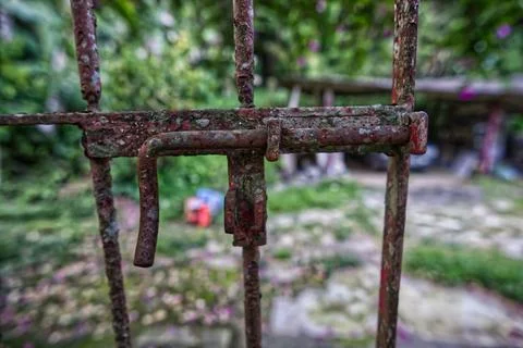 Close-up of an old, rusty iron gate Stock Photos