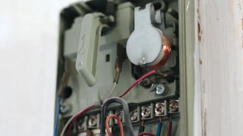 Close-up of an old security system at home, open intercom box with defective Stock Footage 135412513