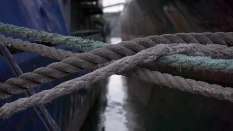 Close-up of old ship nautical knot ropes in the shape of an X cross. Footage Stock Footage 137855438