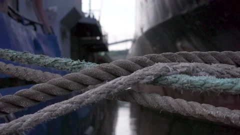 Close-up of old ship nautical knot ropes in the shape of an X cross. Footage 動画素材 137868308