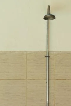 Close up of old shower head on a wall Stock Photos