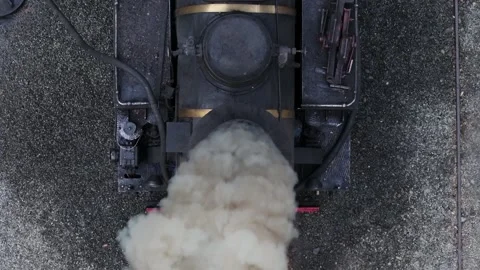 Close up of old train chimney blowing thick smoke, stationary old locomotive Stock Footage 338170223