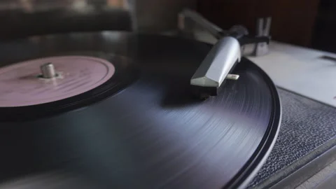 Close up of old vinyl record spinning Stock Footage 137088047