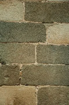 Close-up of old wall made of large stone bricks Stock Photos
