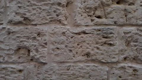Close up of old wall made of white limestone in ruins of medieval castle Stock Footage 317177538