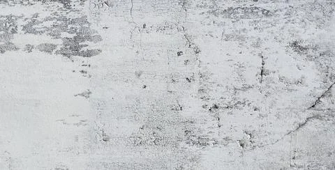 ​Close-up of an old white painted wall texture with cracked, peeling paint. Stock Photos