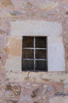 Close-up of old windows in the wall of a house Stock Photos