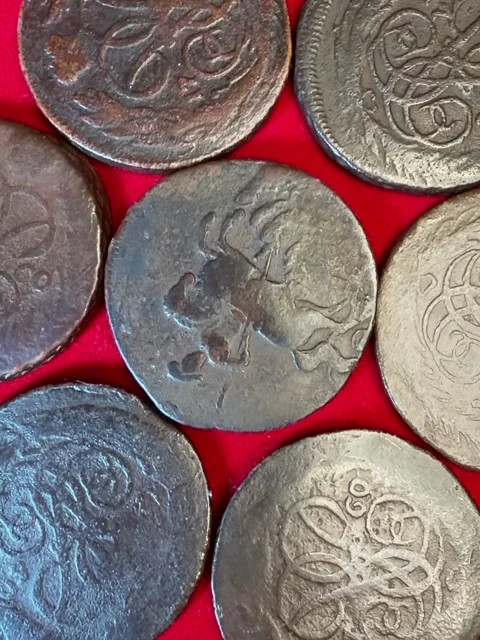 Close-up of old worn 1 kopeck coins 1757-1761 Russian Empire Elizabeth I on.. Stock Footage 337392029