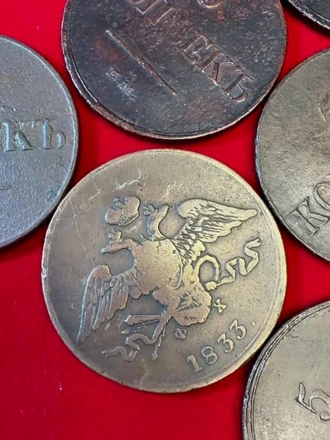 Close-up of old worn 5 kopeck coins 1830-1839 Nicholas I Masonic eagle Russ.. Stock Footage 337392433