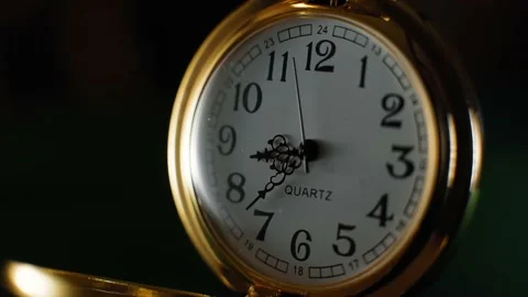 Close up of an old worn gold pocket watch. Vintage watch Time lapse Stock Footage 233602015