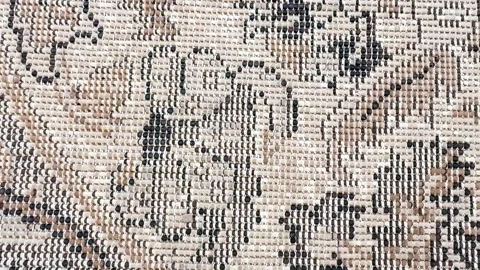 Close-up of old woven carpet pattern with slow camera movement Stock Footage 340900076