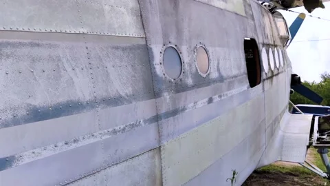 A close-up of an old wrecked passenger plane that has been decommissioned and st Video stock 155780705