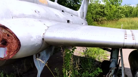 A close-up of an old wrecked passenger plane that has been decommissioned and st Video stock 155780731