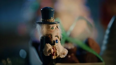 Close Up of Older NutCracker Figure with Christmas Background Stock Footage 248048920