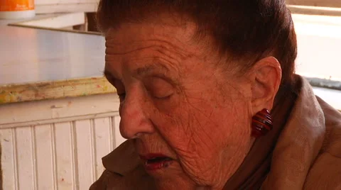 Close Up of Older Woman Painting Stock Footage