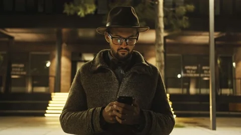 Close up of one arab man using a mobile phone in park during new. Stock Footage 155984590